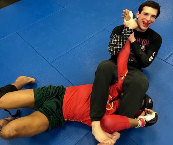 competitors sparring in MMA competition team