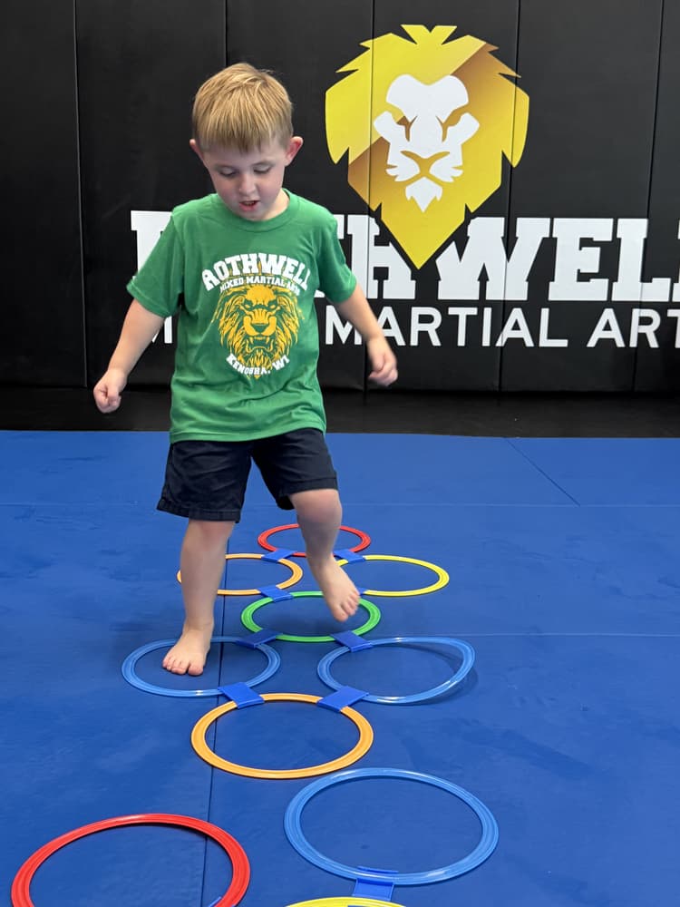 Coach working with a student